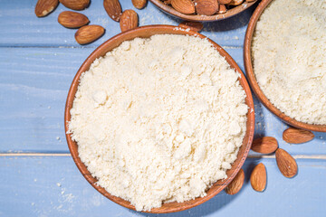 Alternative keto diet gluten grain free flour. Paleo and ketogenic diet baking cooking concept. Almond flour with whole nuts