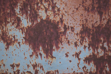 Rusty iron. The texture of the old rusty metal sheet. Closeup.