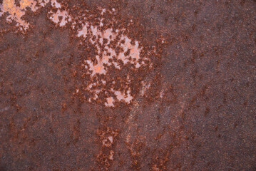 Rusty iron. The texture of the old rusty metal sheet. Closeup.