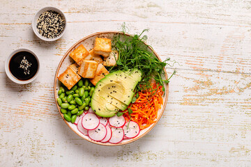 Buddha bowl asian salad with tofu cheese.