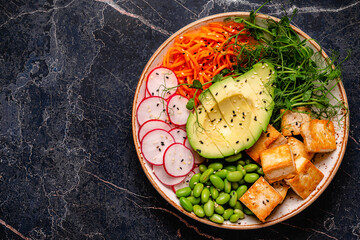 Buddha bowl asian salad with tofu cheese.