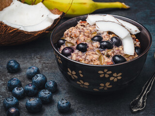 Oatmeal with seeds, nuts and blueberries.
