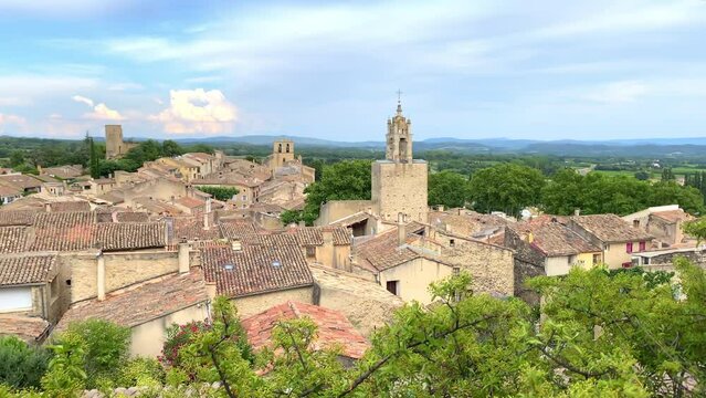 Village of Cucuron in the Luberon valley with a view on the clock tower in Provence, France