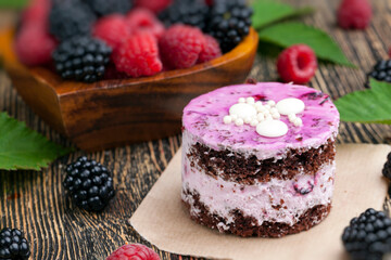 berry cake with chocolate cakes and butter cream with berry jam