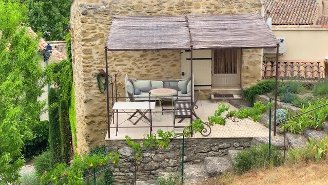 terrace of a gite rented by tourists during summer in the village of Cucuron in the Luberon valley in Provence, France