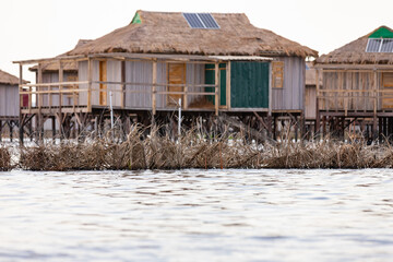 Fototapeta na wymiar Beninese lakeside village, house on the lake village on a lake