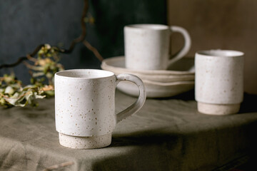 Obraz na płótnie Canvas Set of empty craft ceramic coffee cups