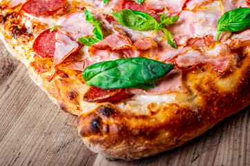 flatbread Pepperoni Pizza with Mozzarella cheese, salami, ham, Tomato sauce, pepper, Spices. Italian pizza on wooden background