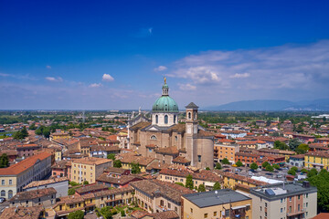 Fototapeta premium Italian church aerial view. Historic churches of Italy top view. Italian city aerial view. Parrocchia Santa Maria Assunta view from above. Historical Italy aerial view.