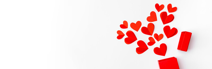 Valentine's Day background banner. Gifts, hearts on white. Concept of love and affection. Holiday card. Simbol of love.