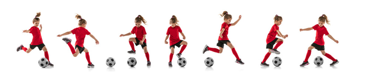 Full-length portrait of little girl, child, training, playing football isolated over white background. Collage © Lustre Art Group 