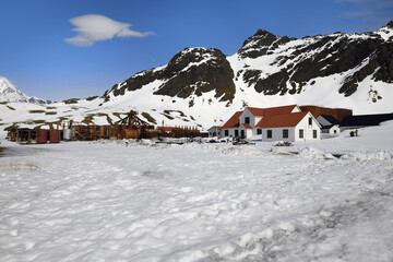 Former Grytviken whaling station under snow, King Edward Cove, South Georgia, South Georgia and the Sandwich Islands, Antarctica