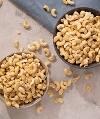Dry nuts in glass jars, on white background. Food storage. Glass Containers. Kitchen need.