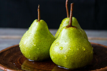 Fototapeta na wymiar pears on a wooden table