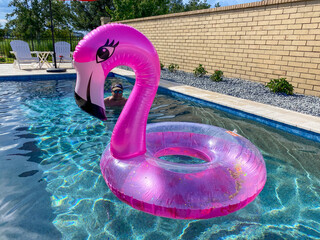 Pink Flamingo pool float in a private pool in Orlando, Florida.