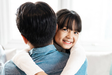 father and daughter at home