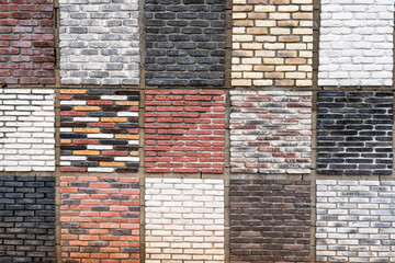 Decor stone cladding plates on the wall. Front exterior and  interior castle facade with ancient old brick stone wall texture pattern in various colors.
