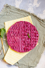Quiche. Beetroot pia with vegetable filling