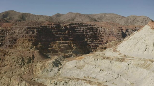 Aerial flight over the Queen mine in Bisbee Arizona.  This is an very large open pit mine.