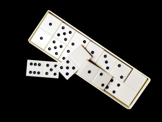 Classic domino game isolated on a black background