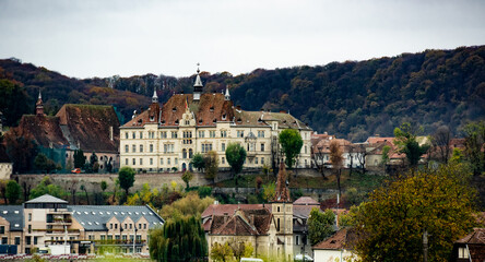Ancient Sighisoara city in Romania, panoramic old clock tower, castle and medieval architecture...