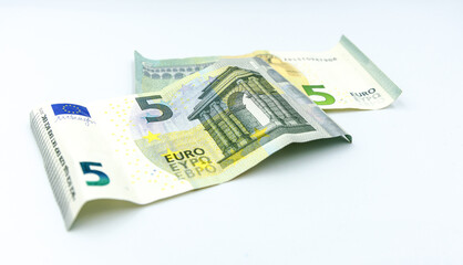 Euro banknotes and coins.
