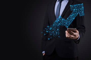 Businessman hold graph, arrow of positive growth icon.pointing at creative business chart with...