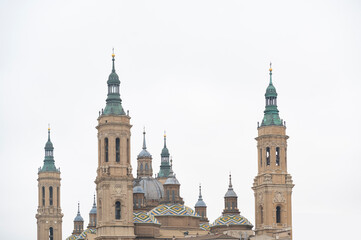 Fototapeta na wymiar Basilica del Pilar in Zaragoza in the north of Spain in a cloudy day