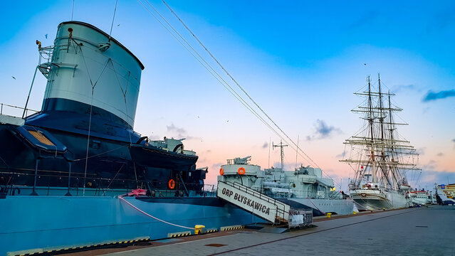 Gdynia, Poland - February 7, 2022: Museum ship ORP Blyskawica and sailing ship SV Dar Pomorza at the waterfront in Gdynia, Poland