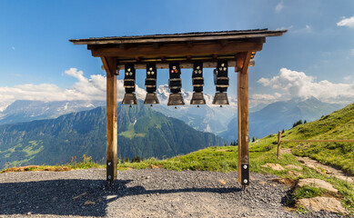 Swiss cowbells on the background of the Alps