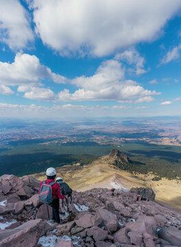Young woman with backpack in malinche volcano