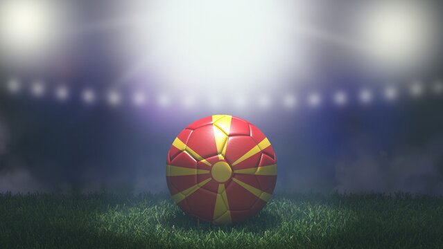 Soccer ball in flag colors on a bright blurred stadium background. North Macedonia. 3D image