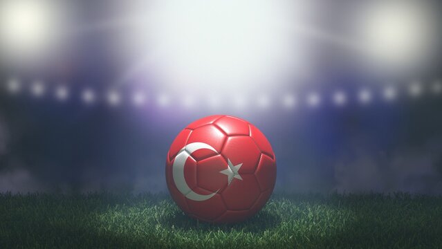 Soccer ball in flag colors on a bright blurred stadium background. Turkey. 3D image