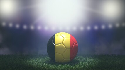 Fototapeta premium Soccer ball in flag colors on a bright blurred stadium background. Belgium. 3D image
