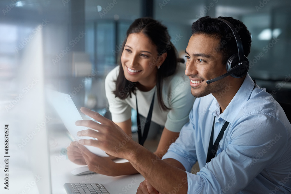 Poster customer care is more than a department, its an experience. shot of a young man and woman using a co