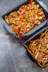beef with udon noodles, rice in tiriyaki sauce. Korean food delivered in container boxes. box container with korean food