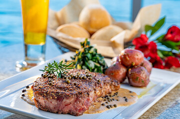 Peppercorn Crusted New York Strip Steak with Red Potatoes and Spinach