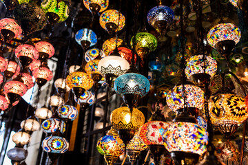 Colorful mosaic hanging lantern lamps, a popular turkish souvenir for sale at a gift shop on a...