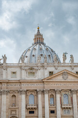 Fototapeta na wymiar Dramatic view over Saint Peter Basilica in Vatican city, in the center of Rome, Italy, with heavy clouds.