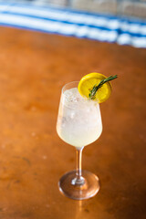 Lemonade vodka cocktail on a copper table top