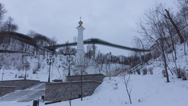 Time lapse of the Column of Magdeburg Law in Kiev, Ukraine. Day to night smooth transition. The Column of Magdeburg Law in Kiev was built in 1802.