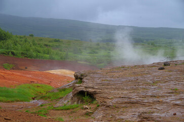 Supernatural landscape at geothermal field Mars like site Geysir Strokkur Haukadalur wasteland with...