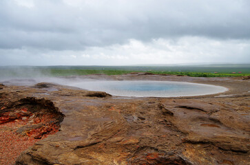 Supernatural landscape at geothermal field Mars like site Geysir Strokkur Haukadalur wasteland with...
