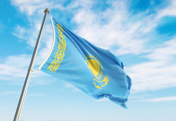 3d rendering Kazakhstan flag waving in the wind on flagpole. Perspective wiev Kazakhstan flag waving a blue cloudy sky