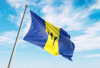 3d rendering Barbados flag waving in the wind on flagpole. Perspective wiev Barbados flag waving a blue cloudy sky