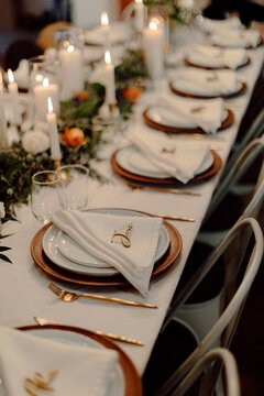 Dinner tables at wedding in the winter during an evening celebration