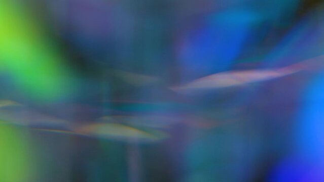 Abstract movement of soft light reflected in a prism
