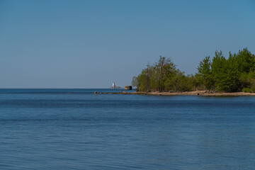 Russia. Kronstadt. May 30, 2021. The Reef Fort and Tolbukhin Lighthouse are on the horizon.