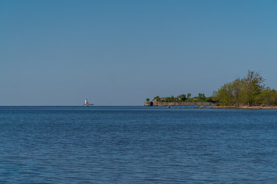 Russia. Kronstadt. May 30, 2021. The Reef Fort and Tolbukhin Lighthouse are on the horizon.