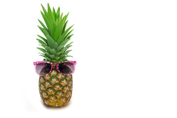 Pineapple in sunglasses on a white background. Ripe juicy fruit in trendy sunglasses on a white background. Pineapple in the form of a male face with a hairstyle with free space for text